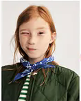 Girl model styled in a dark green jacket with scarf details.